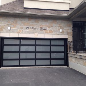 Modern Fiberglass Garage Door with Frosted Door Lites instaled in Oakville