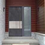 Modern Exterior Door with Stainless Steel bar Installed in Modern-Houme in Bathurst