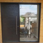 Fiberglass Woodgrain Single Modern Door with Clear Glass Door Lite installed by Modern Doors