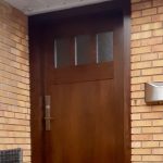 Traditional single front entry door Wood Grain Finish