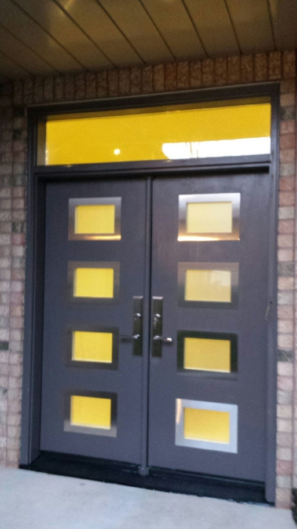 Modern Exterior Door with 8 door lites and stainless steel frams with Transom installed in Kong City, Ontario by modern-doors.ca-Front View