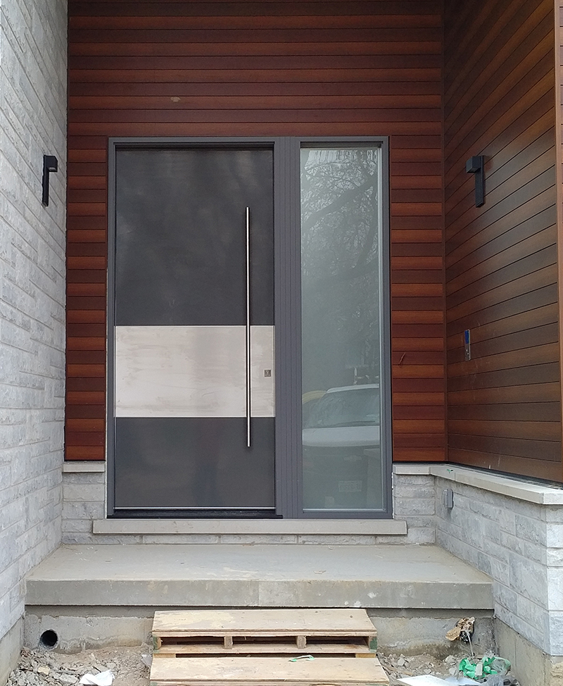Modern Exterior Door with Stainless Steel bar Installed in Modern-Houme in Bathurst