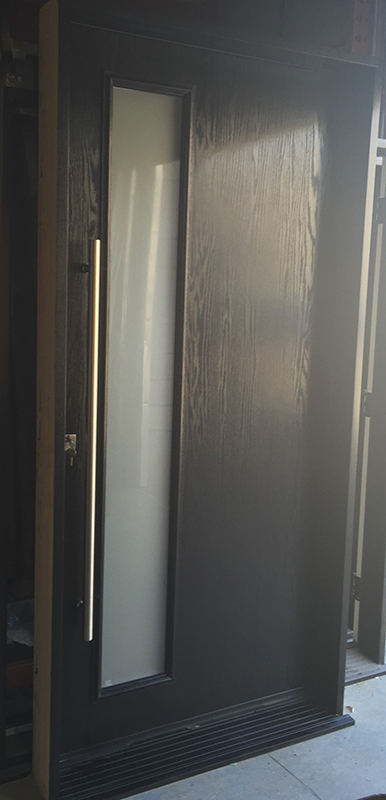 Modern Exterior Woodgrain with Door lite and Stainless Steel Bar Manufactured by Modern Doors