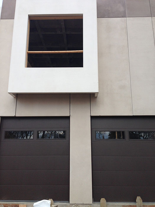 Modern Garage Doors with 2 clear Door Lites-Fiberglass Garage Doors installed in Modern House
